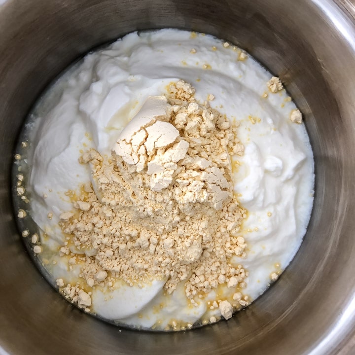 Add besan to yogurt in a saucepan