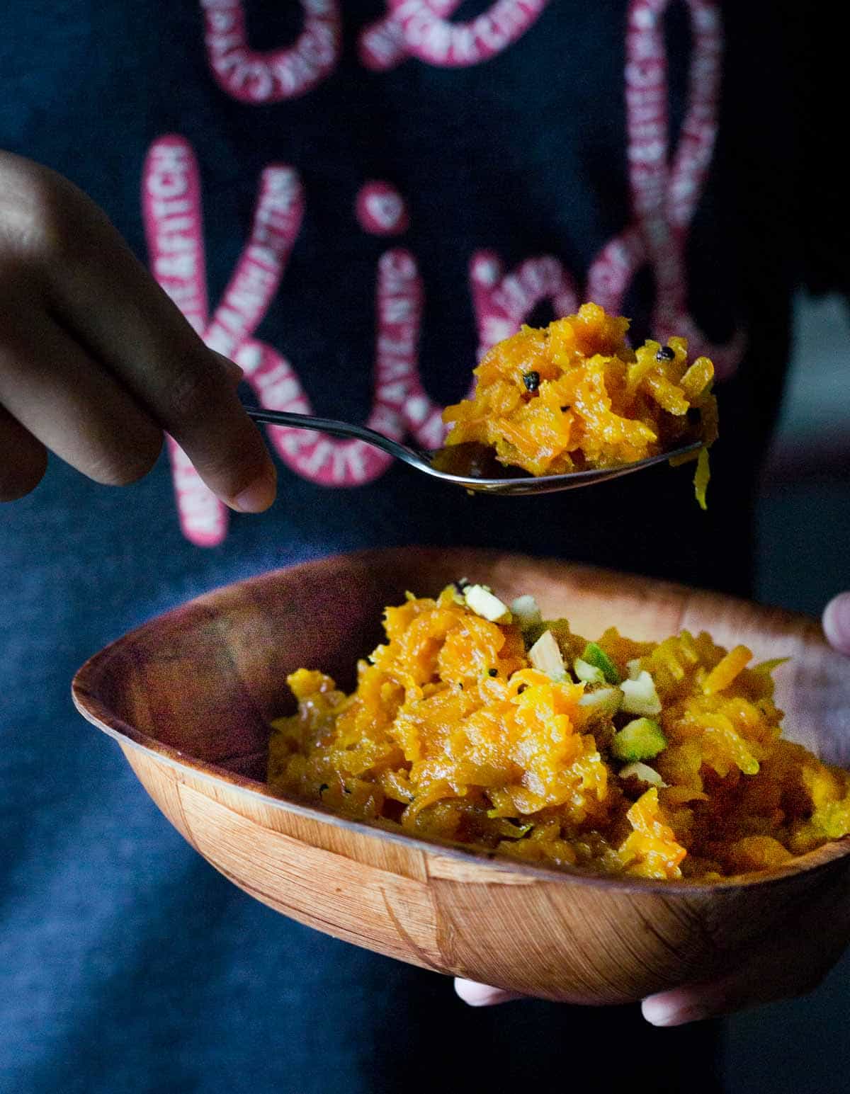 My kid savoring the carrot halwa that I made using the Instant Pot
