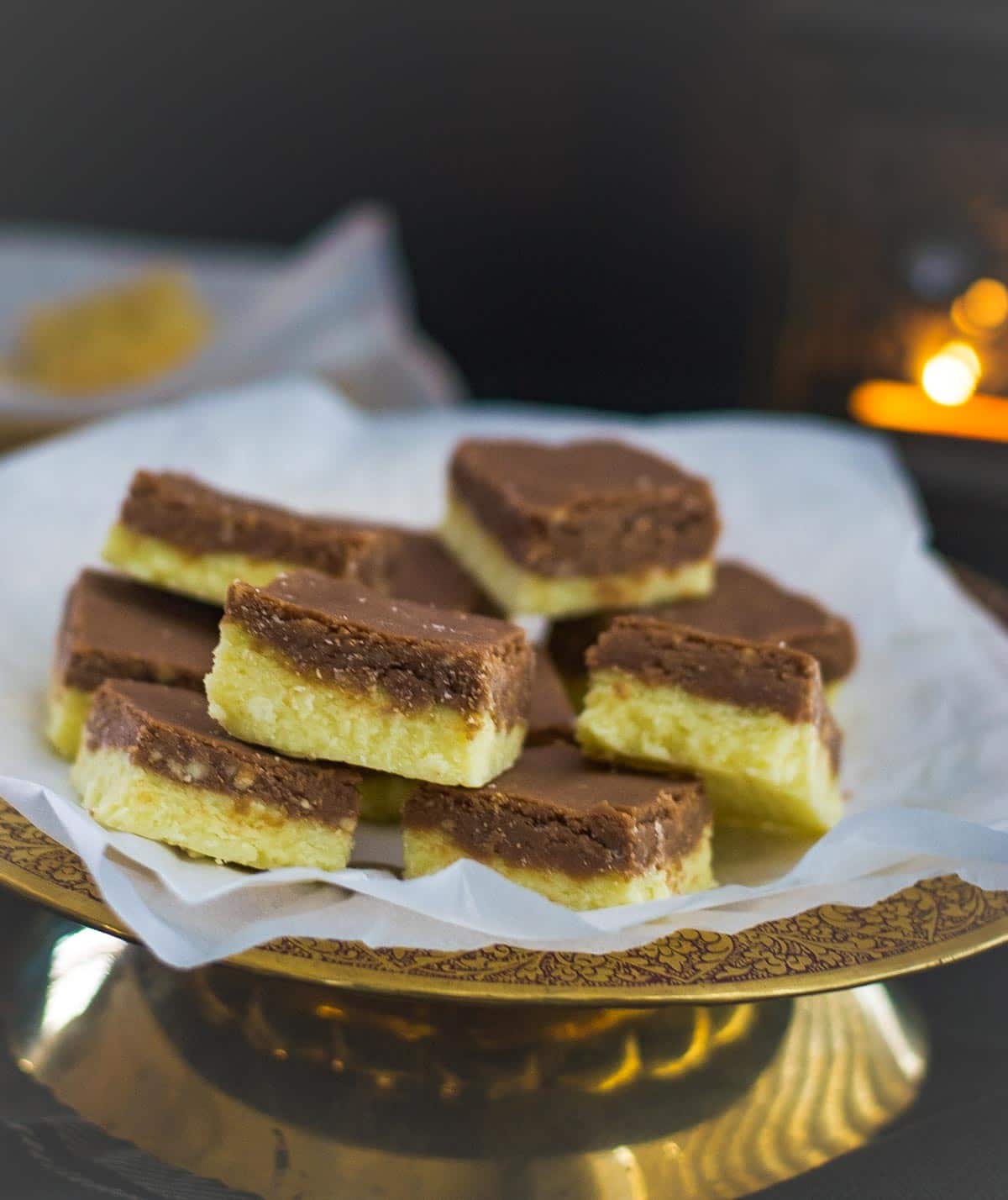 This 2 layered Chocolate Barfi recipe is sure to steal your heart. Follow this fail-proof and easy recipe to make this Chocolate Barfi in a microwave. 