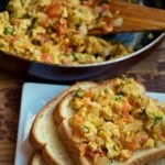 Bhurji served over slices of bread on a plate