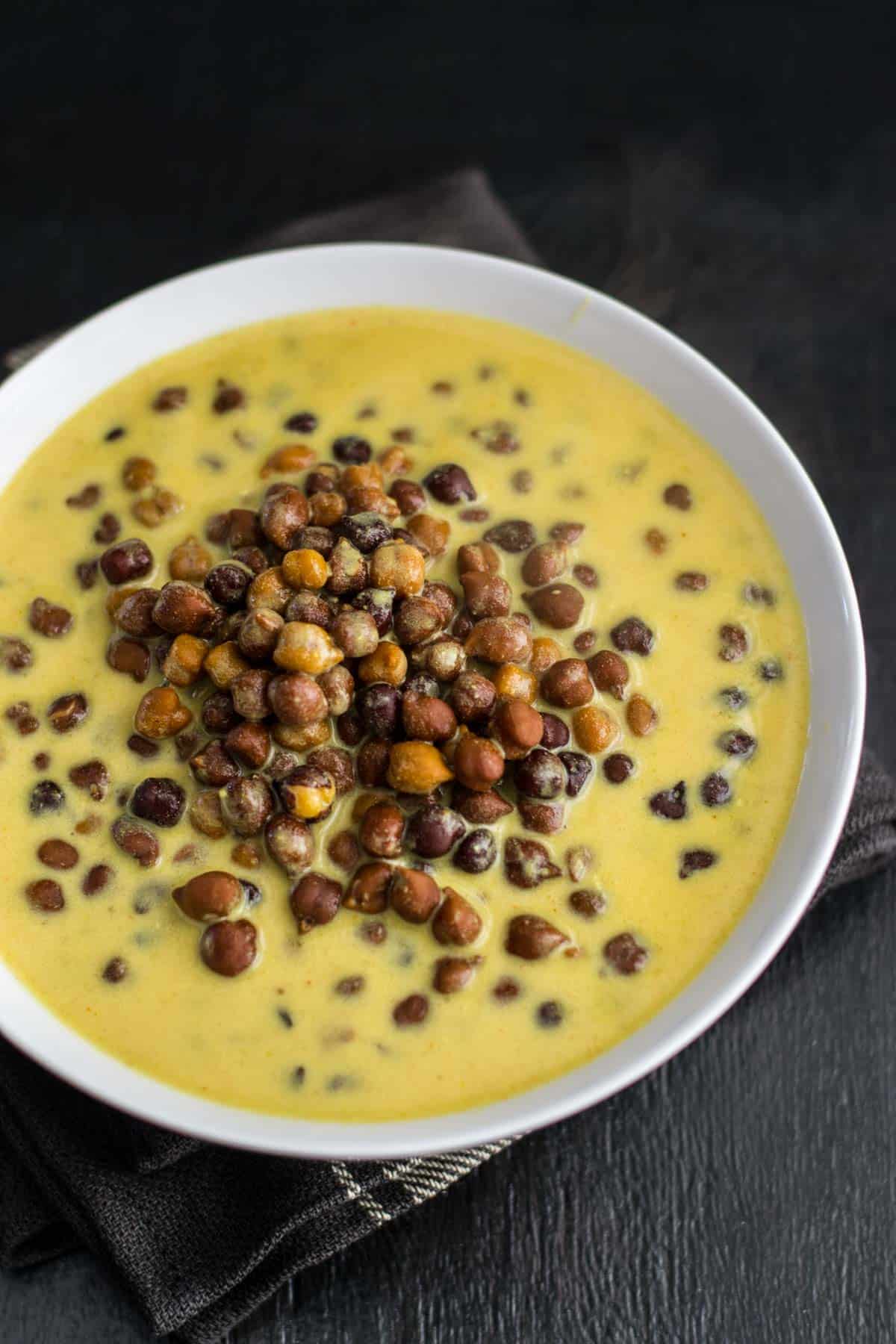 If you are looking for a gravy recipe that you can make in less than 30 minutes then this recipe for Black chickpeas in a yogurt gravy (Kaale Channe Ki Kadhi) will be perfect f