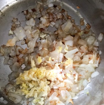Frying onions for dum aloo