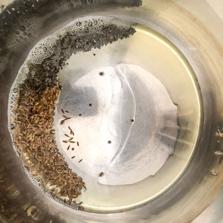 Add jeera, cumin seeds to oil in an Instant Pot