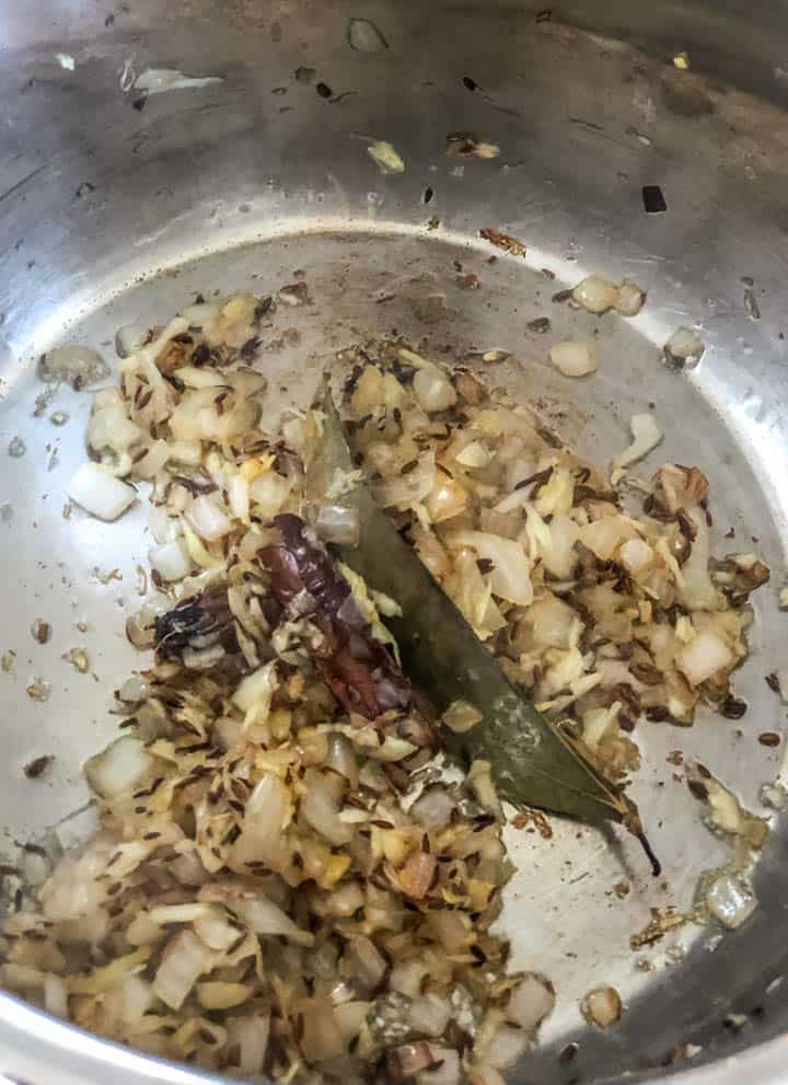 Ginger and garlic are fried with onions