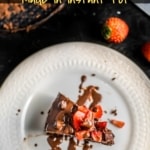 A white plate with a slice of instant pot brownies topped with strawberries and the words Easy Homemade Brownie Recipe made in Instant Pot at the top.