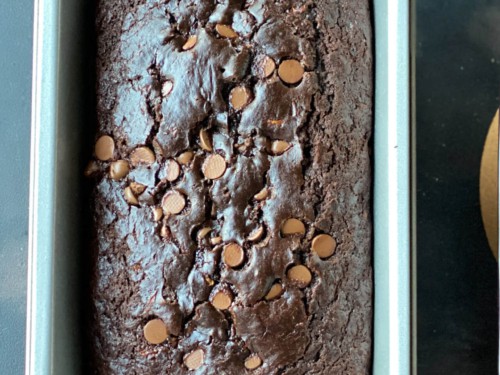 Chocolate Zucchini Bread in a metal loaf pan