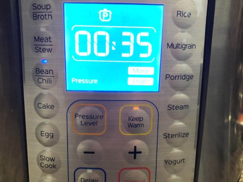 The control panel of an instant pot with the time set to 35 minutes.