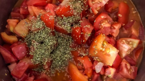 Tomatoes and oregano added to the instant pot.