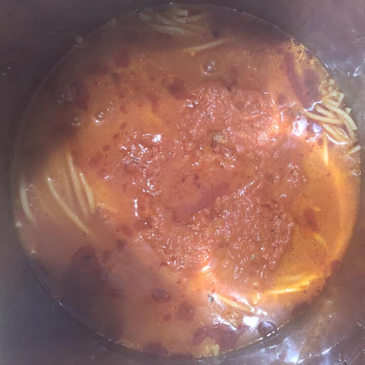 Cooked pasta in the instant pot before stirring.