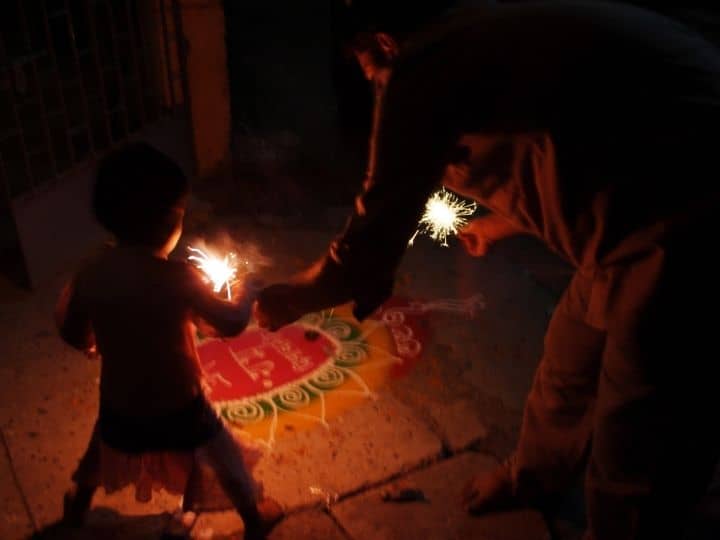 Kids bursting crackers on Diwali