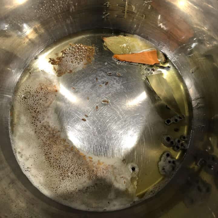 Oil and spices in the instant pot.