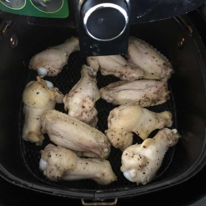 Chicken in air fryer half way through cooking.