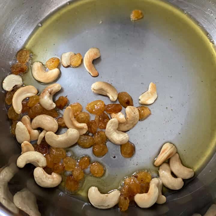 Raisins being fried along with cashews