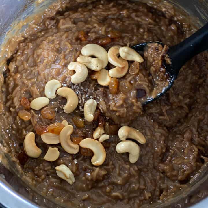 roasted cashews and raisins added to sweet Pongal