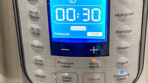 The front panel of an Instant pot showing 30 minutes.