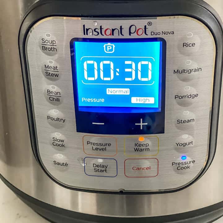 The front panel of an Instant pot showing 30 minutes.