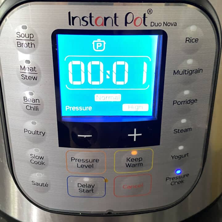 The control panel showing 1 minute for the cook time.