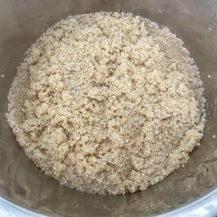 Fully cooked quinoa in the instant pot inner chamber.