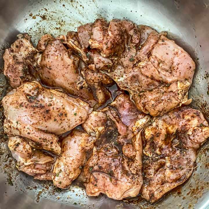 Marinated chicken in a steel bowl