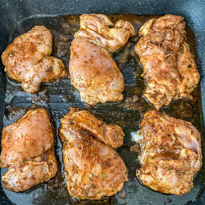 Chicken cooked in a black grill pan