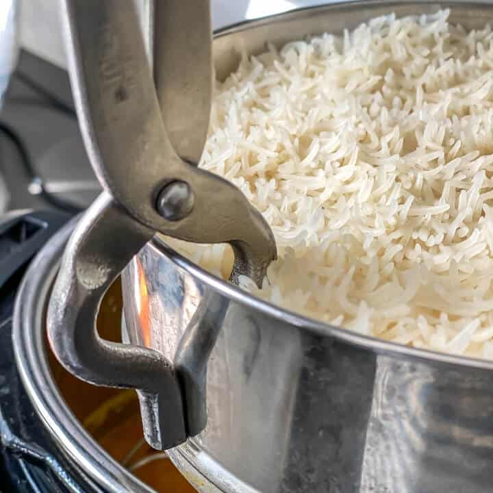 Tongs used to pick rice container from Instant Pot