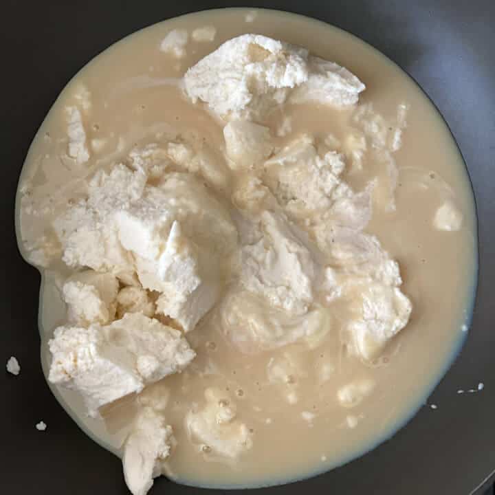 Condensed milk and ricotta cheese mixed in a pan