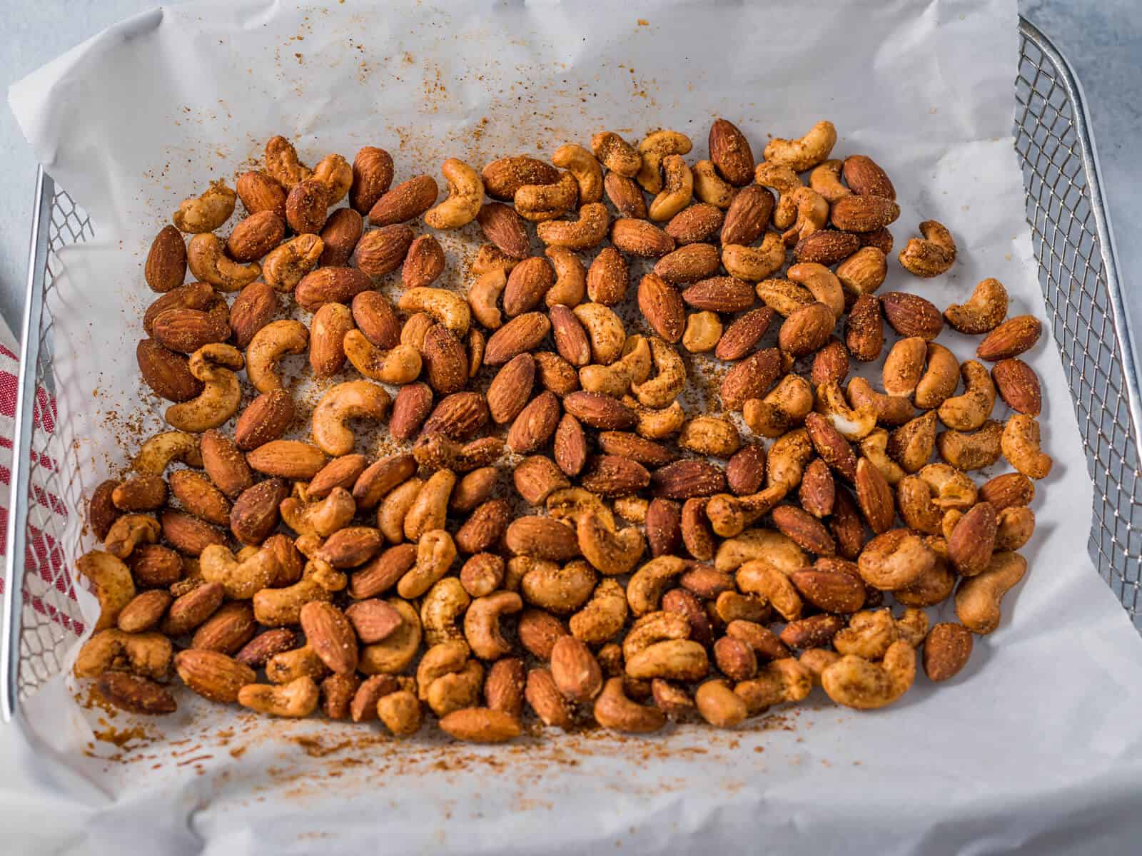 roasted spiced nuts in a tray