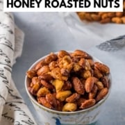 Honey roasted nuts in a bowl with a peacock in it