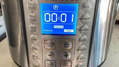 An Instant Pot with the timer set for "1 minute"