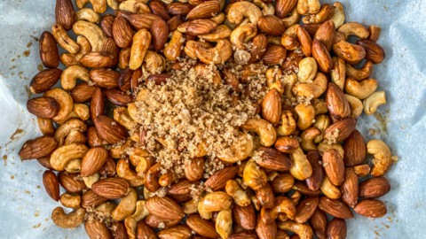 Brown sugar added to roasted nuts