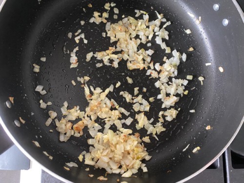 Browning onion in a skillet.
