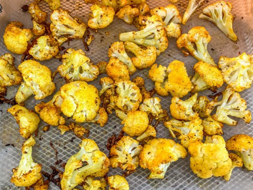 Cauliflower that has been slightly roasted in an air fryer.