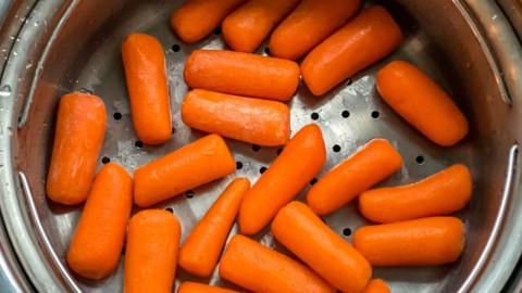 Carrots in the steamer basket of the instant pot.