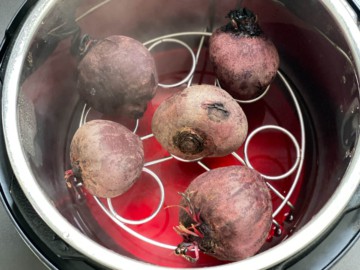 Beets on top of a trivet in the instant pot without steaming.