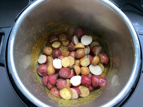 Baby potatoes added to the instant pot.