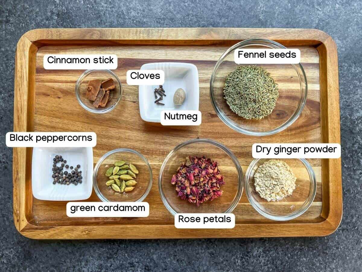 The spices needed to make a chai masala mix.