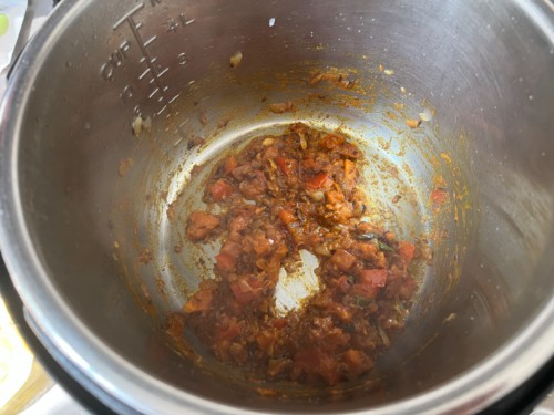 Cooked and softened tomatoes in the instant pot.