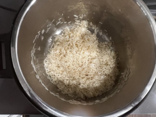 Rice added to an Instant Pot.