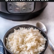 A black bowl filled with freshly cooked Jasmine rice and a silver spoon to the right with the words Easy and Fluffy Instant Pot Jasmine Rice at the top.