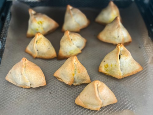 Samosas that are half cooked through.