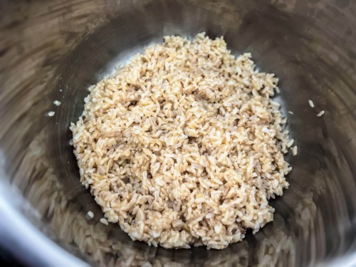 Cooked rice that has been fluffed with a fork.