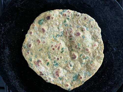 A fully cooked paratha.