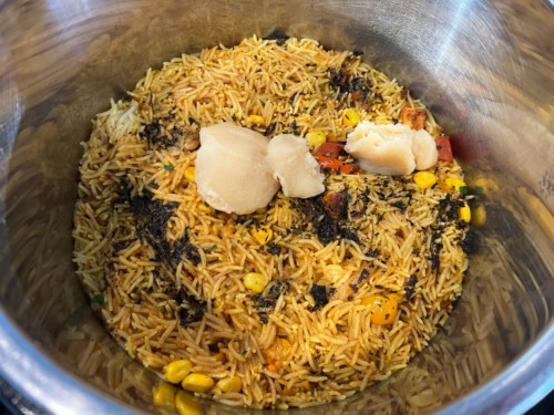 Rice in the Instant Pot to make paneer biryani.