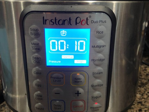 An Instant Pot with a 10-minute timer